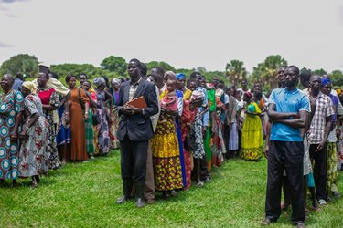 Community members queue for the election of the parish climate change committee in Awalmon, Uganda