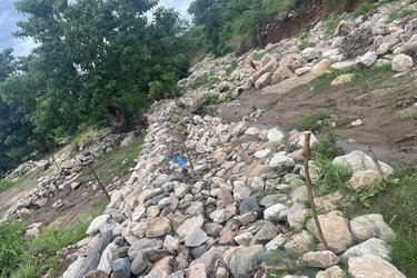 Site along Bogolo River where new dike will be constructed