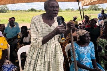 Women talking during community mobilisation activities in Uganda